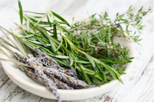 Lavender, rosemary and other herbs in a bowl