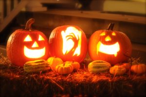 Three jack-o-lantern pumpkins